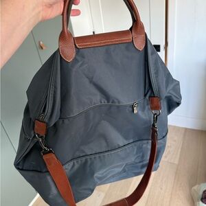 Longchamp navy tote duffle with expanding zipper and shoulder strap